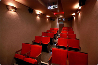 Illustration for article titled Who Cares About Traffic When You're Riding in the Movie Theater Bus